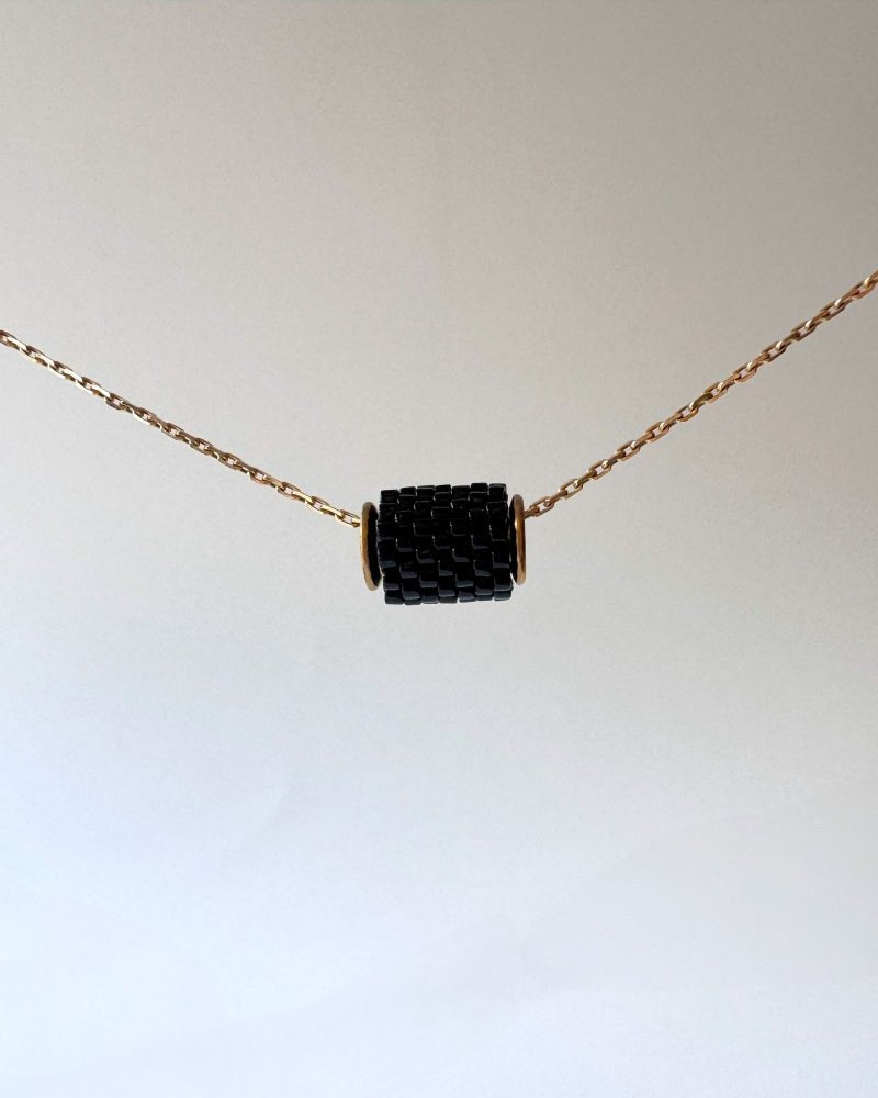 Single pure black beaded pendant crafted in peyote stitch technique from Japanese Miyuki Delica beads - Fleur Du Jour