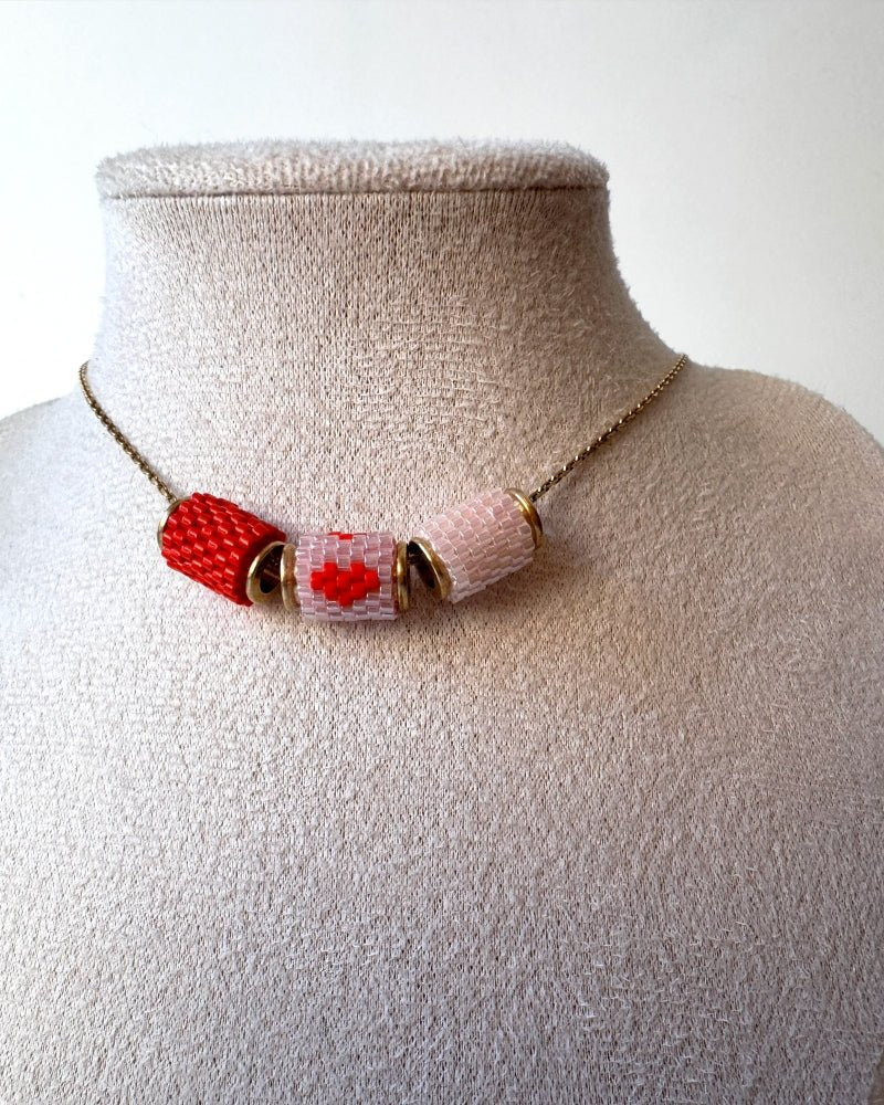 image Necklace with three beaded charms crafted in peyote stitch technique using Japanese Miyuki Delica beads in scaret red and pale pink palette with heart motif - Fleur Du Jour
