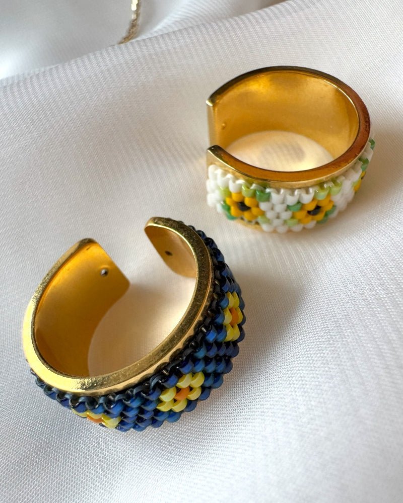Collection of gold-plated rings with beaded inlay crafted in peyote stitch technique from Japanese Miyuki beads in a variety of floral designs - Fleur Du Jour