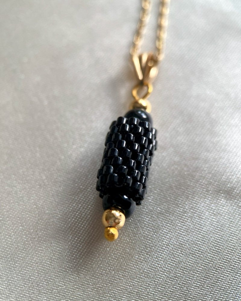 Black beaded pendant crafted in peyote stitch technique from Japanese Miyuki beads - Fleur Du Jour