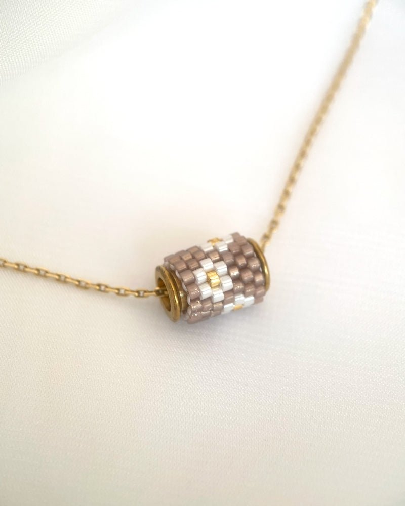 Single beaded pendant crafted in peyote stitch technique from Japanese Miyuki Delica beads in design inspired by edelweiss flower - Fleur Du Jour