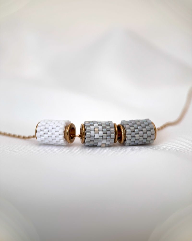 Necklace with three switchable beaded pendants crafted in peyote stitch technique from Japanese Miyuki Delica beads in neutral grey color palette - Fleur Du Jour