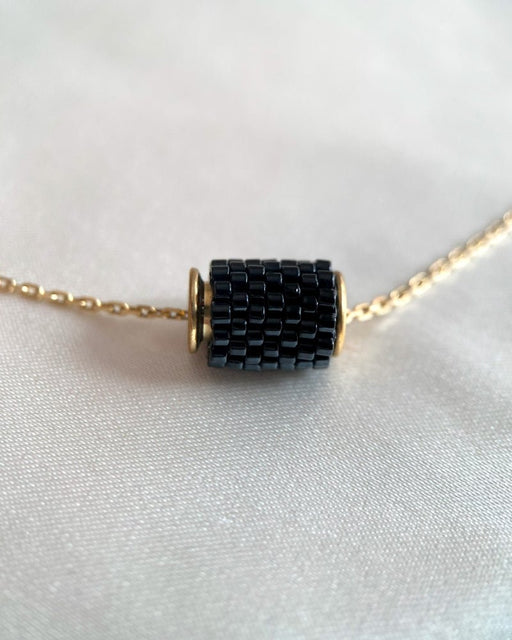 Single pure black beaded pendant crafted in peyote stitch technique from Japanese Miyuki Delica beads  - Fleur Du Jour