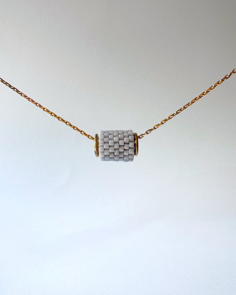 Single beaded pearl grey pendant crafted in peyote stitch technique from Japanese Miyuki Delica beads - Fleur Du Jour