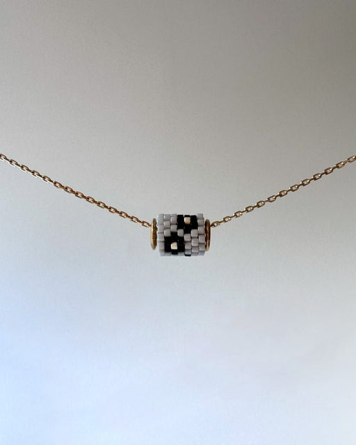 Single beaded pendant crafted in peyote stitch technique from Japanese Miyuki Delica beads in neutral design inspired by edelweiss flower - Fleur Du Jour