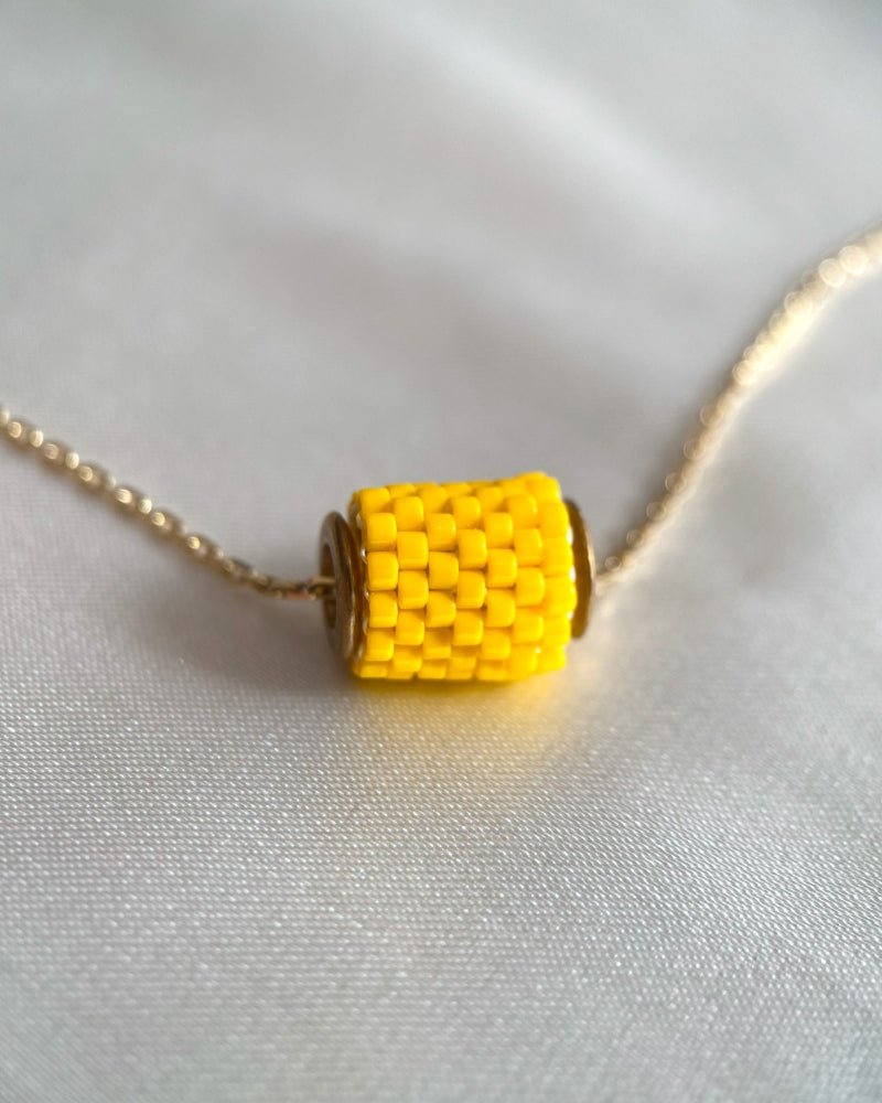 Single beaded orange pendant crafted in peyote stitch technique from Japanese Miyuki beads - Fleur Du Jour