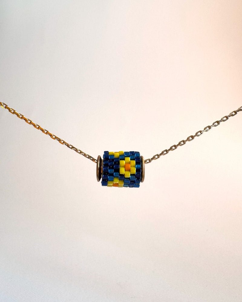 Single beaded navy blue pendant crafted in peyote stitch technique from Japanese Miyuki beads - Fleur Du Jour