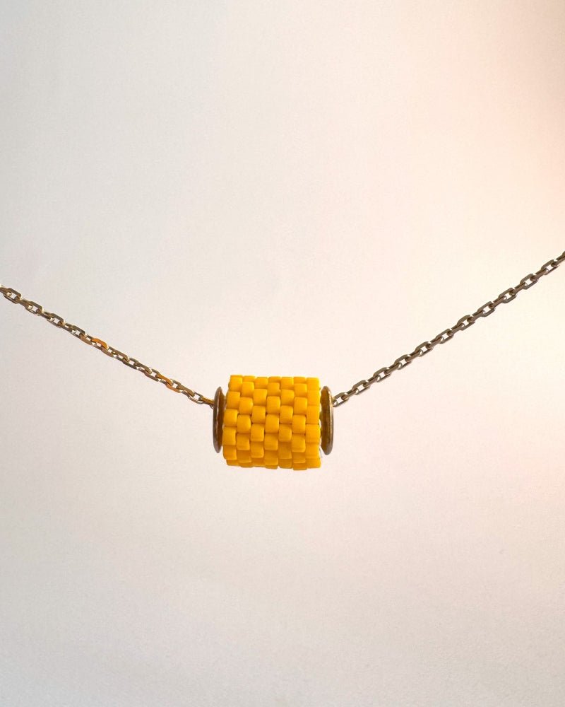 Single beaded orange pendant crafted in peyote stitch technique from Japanese Miyuki beads - Fleur Du Jour