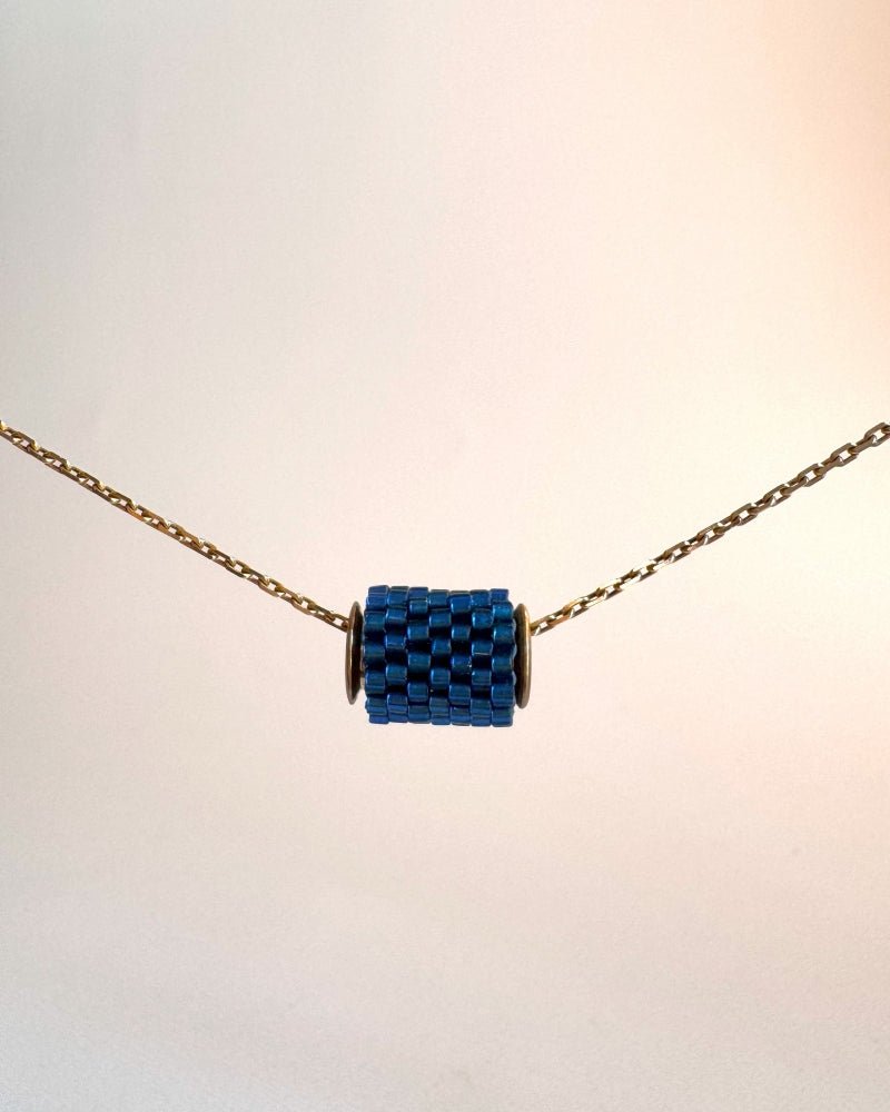Single beaded navy blue pendant crafted in peyote stitch technique from Japanese Miyuki beads - Fleur Du Jour