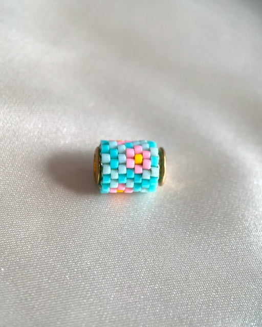 Single beaded pendant crafted in peyote stitch technique from Japanese Miyuki beads in a floral design inspired by roses - Fleur Du Jour