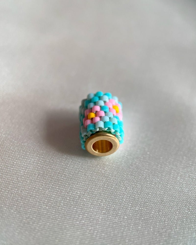 Single beaded pendant crafted in peyote stitch technique from Japanese Miyuki beads in a floral design inspired by roses - Fleur Du Jour