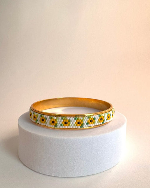 Gold-plated bangle bracelet with beaded inlay crafted in peyote stitch technique from Japanese Miyuki beads in a color palette inspired by sunflowers - Fleur Du Jour