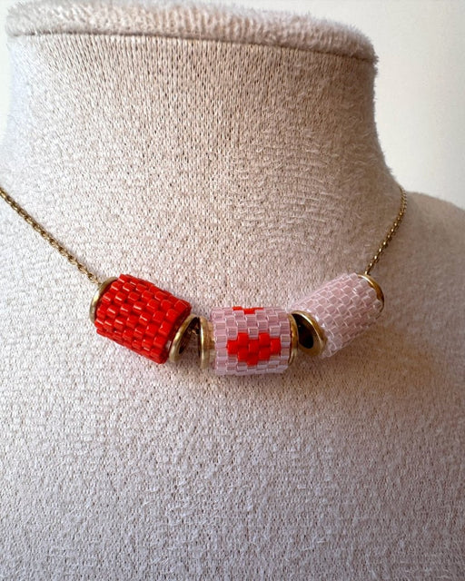 Necklace with three beaded charms crafted in peyote stitch technique using Japanese Miyuki Delica beads in scaret red and pale pink palette with heart motif - Fleur Du Jour