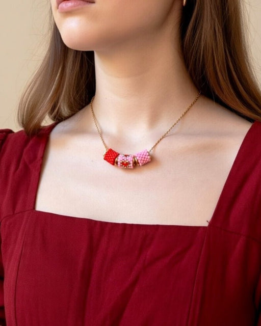 Necklace with three beaded charms crafted in peyote stitch technique using Japanese Miyuki Delica beads in scarlet red and pink palette with heart motif - Fleur Du Jour