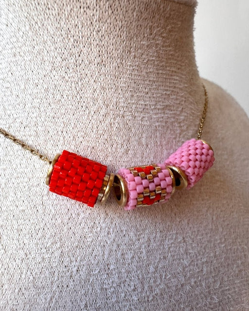 Necklace with three beaded charms crafted in peyote stitch technique using Japanese Miyuki Delica beads in scarlet red and pink palette with heart motif - Fleur Du Jour