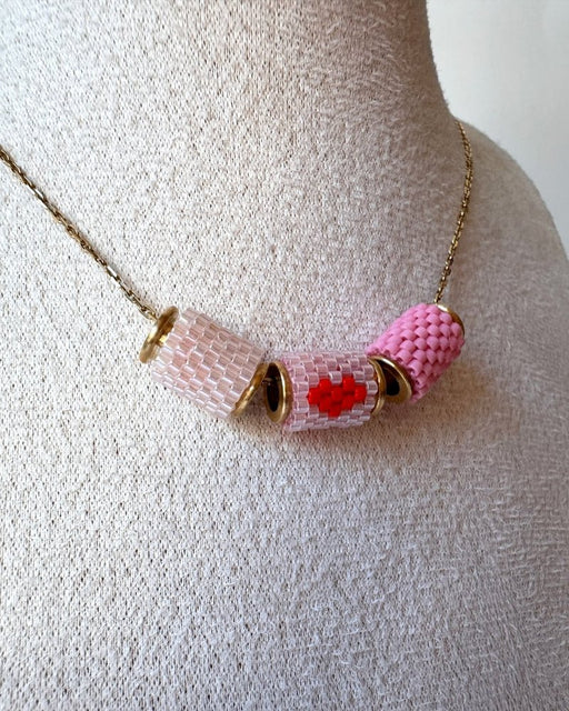 Necklace with three beaded charms crafted in peyote stitch technique using Japanese Miyuki Delica beads in pink palette with scarlet heart motif - Fleur Du Jour