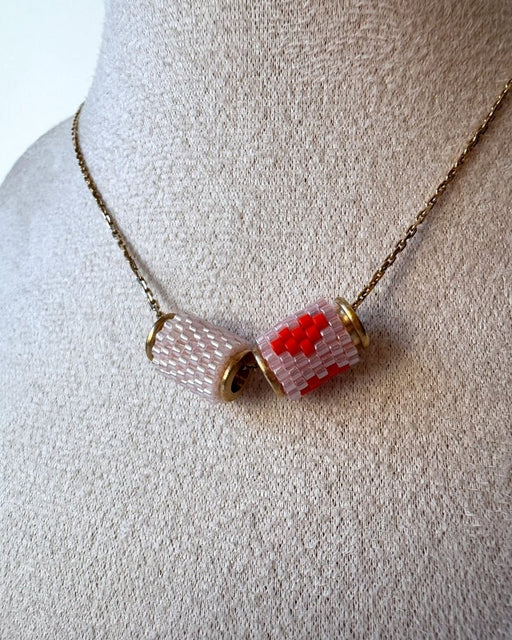 Necklace with three beaded charms crafted in peyote stitch technique using Japanese Miyuki Delica beads in pink palette with scarlet heart motif - Fleur Du Jour