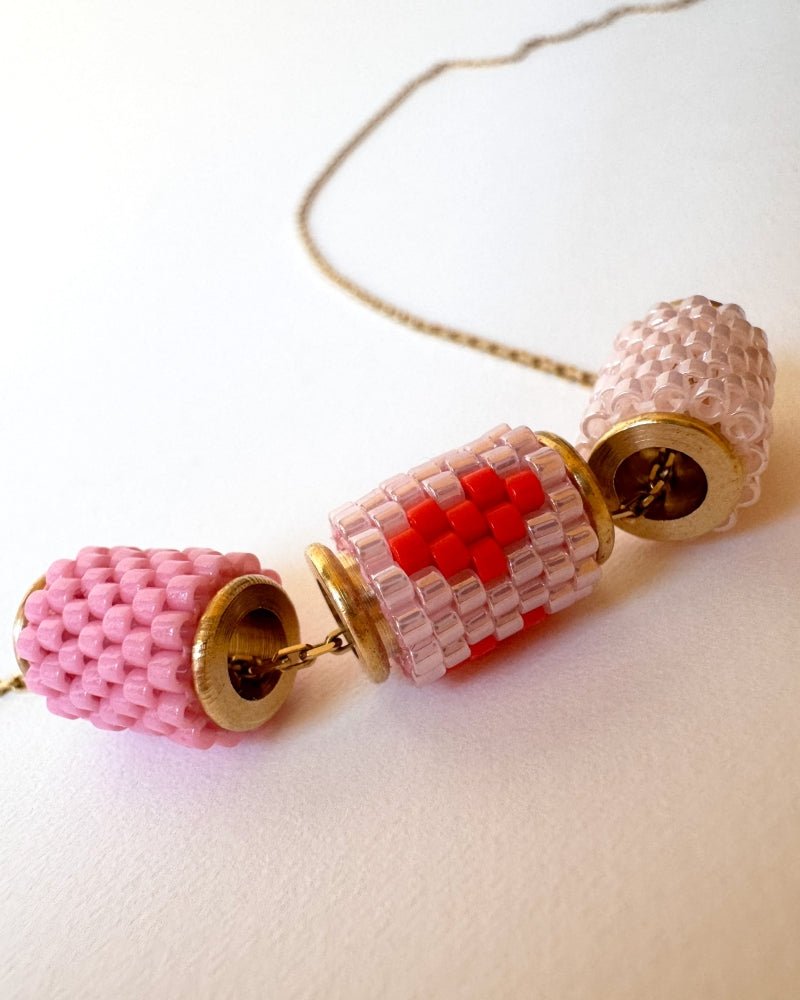 Necklace with three beaded charms crafted in peyote stitch technique using Japanese Miyuki Delica beads in pink palette with scarlet heart motif - Fleur Du Jour