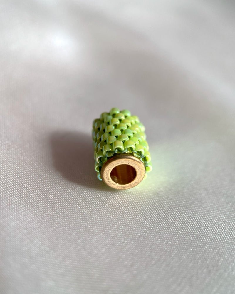 Single beaded pendant crafted in peyote stitch technique from Japanese Miyuki beads in light green color - Fleur Du Jour