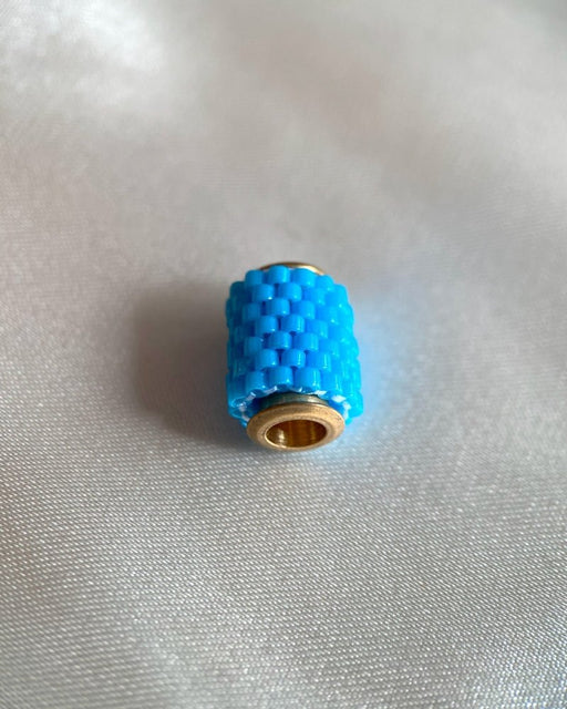 Single beaded pendant crafted in peyote stitch technique from Japanese Miyuki beads in azure blue color - Fleur Du Jour