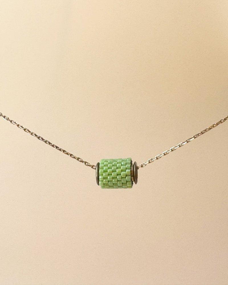 Single beaded pendant crafted in peyote stitch technique from Japanese Miyuki beads in light green color - Fleur Du Jour