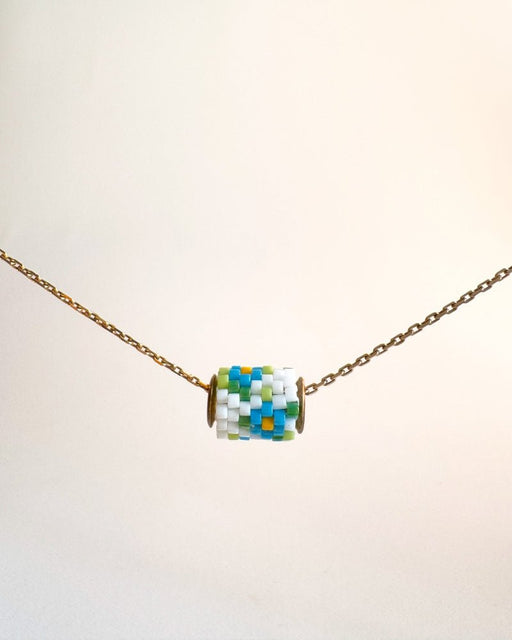 Single beaded pendant crafted in peyote stitch technique from Japanese Miyuki beads in a color palette inspired by forget-me-not flowers - Fleur Du Jour