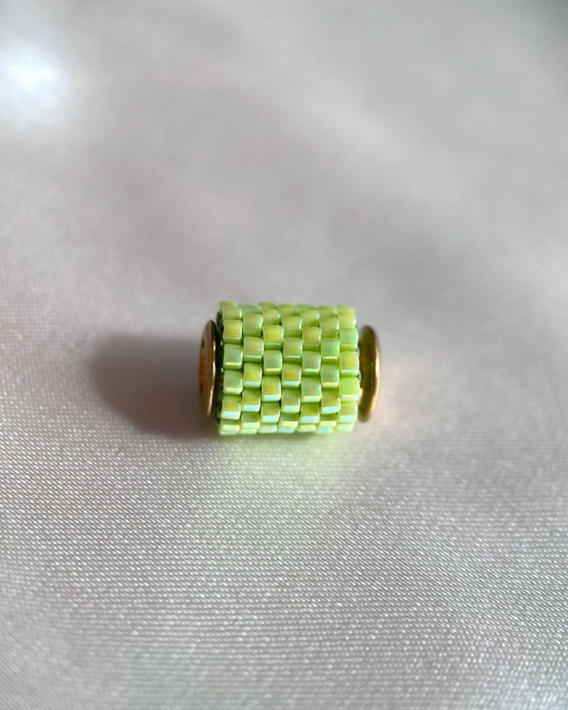 Single beaded pendant crafted in peyote stitch technique from Japanese Miyuki beads in light green color - Fleur Du Jour