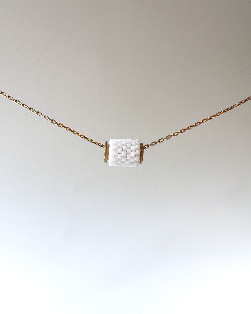 Single beaded pendant crafted in peyote stitch technique from Japanese Miyuki beads in white color - Fleur Du Jour