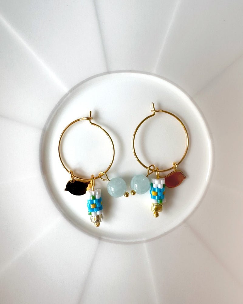 Customizable hoop earrings each with a set of interchangeable charms - beaded, stone and gold - for a new look every day - Fleur Du Jour