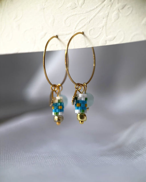 Customizable hoop earrings each with a set of interchangeable charms - beaded, stone and gold - for a new look every day - Fleur Du Jour