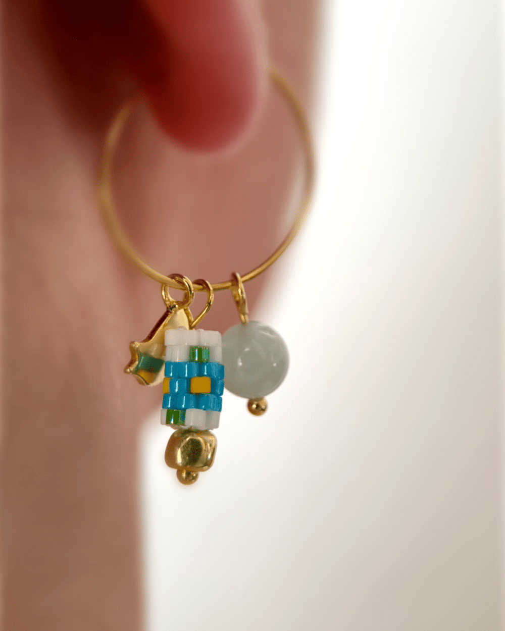 Customizable hoop earrings each with a set of interchangeable charms - beaded, stone and gold - for a new look every day - Fleur Du Jour