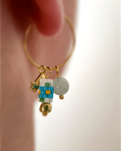 Customizable hoop earrings each with a set of interchangeable charms - beaded, stone and gold - for a new look every day - Fleur Du Jour