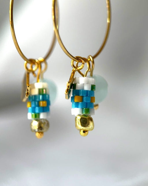 Customizable hoop earrings each with a set of interchangeable charms - beaded, stone and gold - for a new look every day - Fleur Du Jour