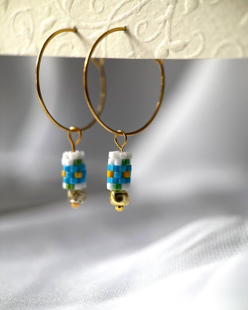 Customizable hoop earrings each with a set of interchangeable charms - beaded, stone and gold - for a new look every day - Fleur Du Jour